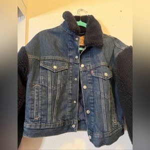 Levi’s fur jean jacket never been touched and still has a tag on it !